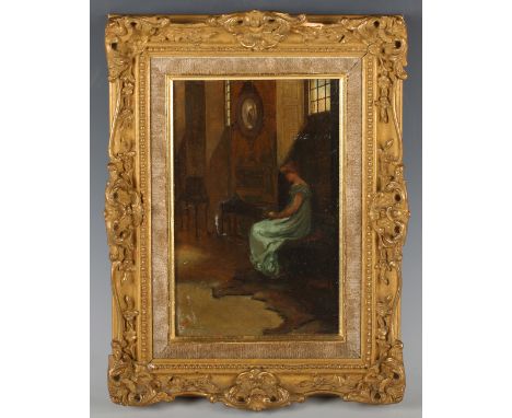 Attributed to Frank Hobden - Lady wearing a Green Dress seated in an Interior, oil on panel, signed with monogram and dated 1