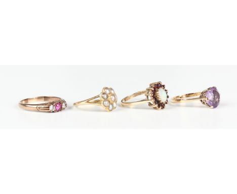 A 9ct gold, opal and garnet oval cluster ring, ring size approx N1/2, a 9ct gold ring, claw set with a circular cut amethyst,