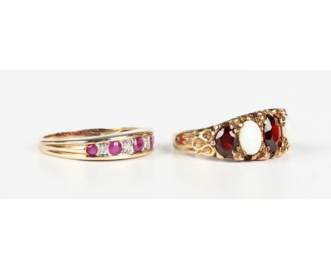 A 9ct gold, garnet and opal five stone ring, mounted with three oval cut garnets alternating with two oval opals, London 1977