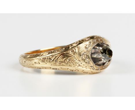 A Continental gold, silver set and diamond single stone ring, 19th century, mounted with an old mine cut diamond in a raised 