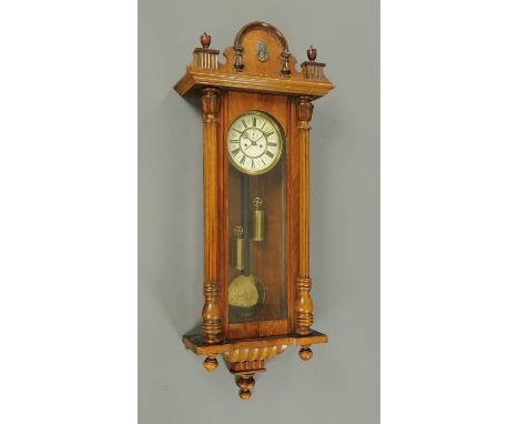 A Vienna twin weight regulator wall clock, with detachable pediment and glazed door. CONDITION REPORT: The clock case is in g