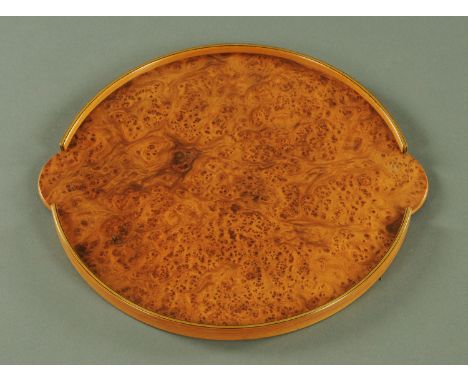 A burr elm "To hand" tray, designed by John Makepeace OBE, double sided with short gallery of magnolia wood, 35.5 cm diameter