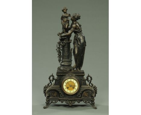 A 19th century French spelter figural mantle clock, with two-train Japy Freres movement striking on a bell.  Height 70 cm.