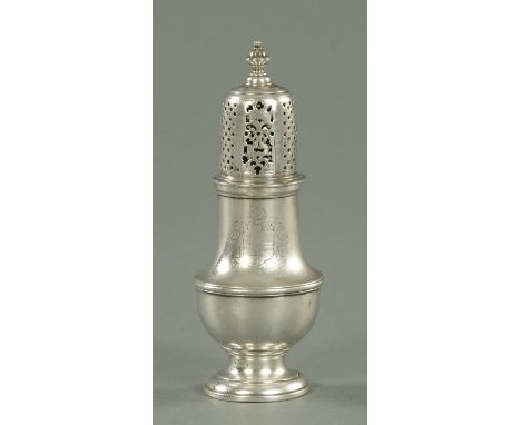 A George II silver pepper castor, London 1730, maker initials rubbed, of typical form, with pierced push on cover with vase f