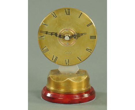A Trench Art mantle clock, height 18.5 cm, diameter 12.5 cm.