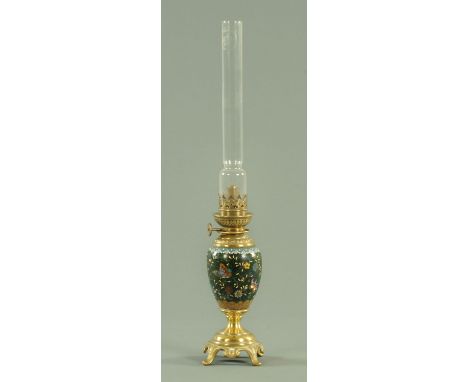 A Chinese cloisonne oil lamp, late 19th century, decorated with butterflies and flowers against a green and aventurine ground
