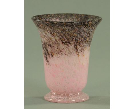 A Monart style glass vase, 20th century, having a flaring rim with amethyst and aventurine body above a mottled pink base, on