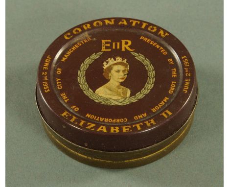 A George V half crown, 1950, presented within an Elizabeth II Coronation tin with lithograph decoration and presented by the 