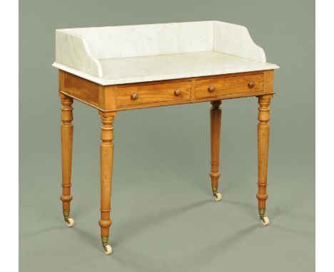 A Victorian satin birch washstand by Heal & Son of London, with marble top, galleried back, fitted with two frieze drawers an