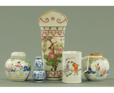 A collection of Chinese porcelain, 20th century, comprising a wall pocket painted with a bird amongst blossoming branches and