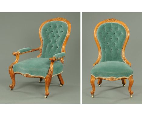 A pair of Victorian walnut ladies and gentleman's chairs, with exposed scroll carved showframes, deep buttoned backs, upholst