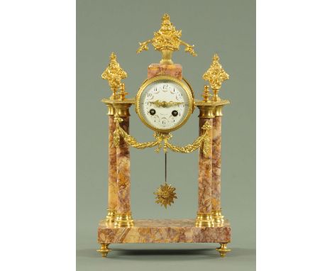 A Continental marble and brass mantle clock, with two-train movement striking on a bell.  Height 40 cm, width 22.5 cm.  