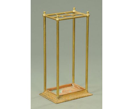 A Victorian brass and iron stick stand, with copper drip tray.  Width 36 cm.  CONDITION REPORT: There are signs of solder to 