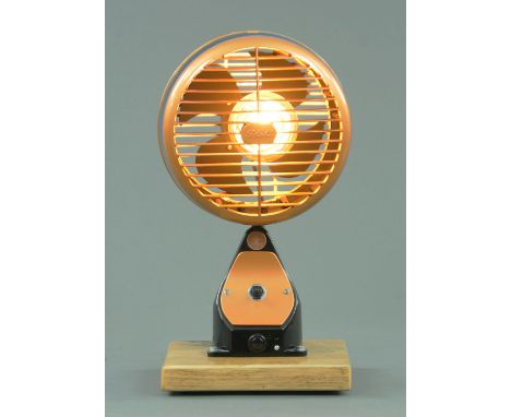 A  Steam Punk inspired table lamp, manufactured from a converted GEC 3KW unit fan heater on wood plinth base, height 48 cm (s