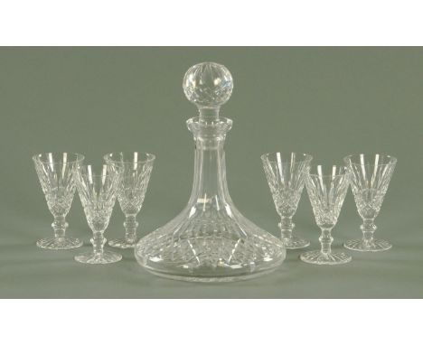 A Waterford glass ships decanter, and a set of 6 Waterford sherry glasses.