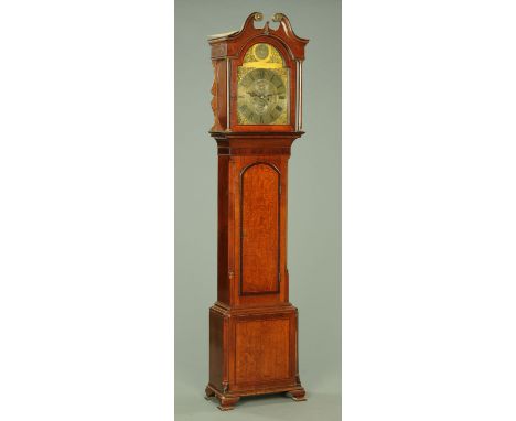 A George III oak and mahogany banded longcase clock, with swans neck pediment above the arched glazed door enclosing the silv