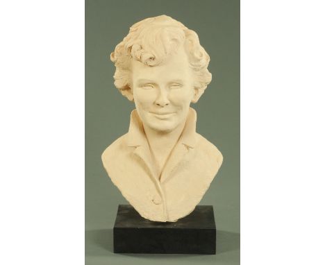 Meryll Evans, a plaster portrait bust of a lady wearing a coat and raised on a plinth.  Height 57 cm. 