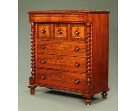 A mahogany Scotch chest of drawers, with frieze drawer, three deep and three long graduated drawers with wooden knob handles,