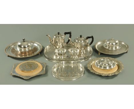 A four piece silver plated tea service, two trays, two salvers, two bread boards, etc. 