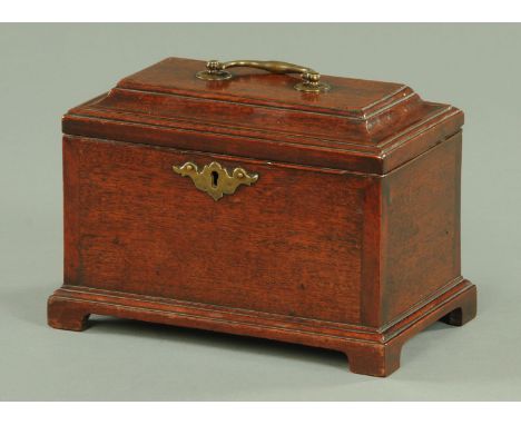A George III mahogany tea caddy, with brass handle to lid, open interior and raised on bracket feet.  Width 25 cm.  CONDITION