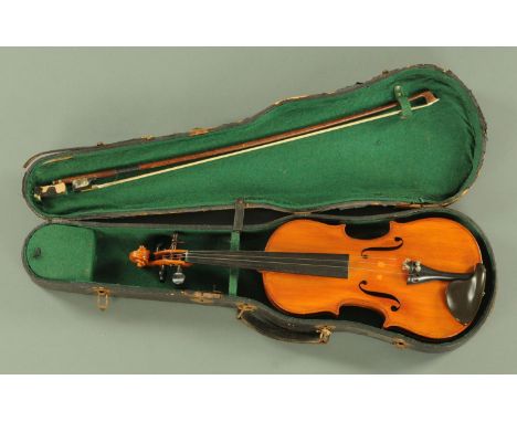 A vintage Czechoslovakian violin, cased and with bow.  Length of back 13.5 ins. 