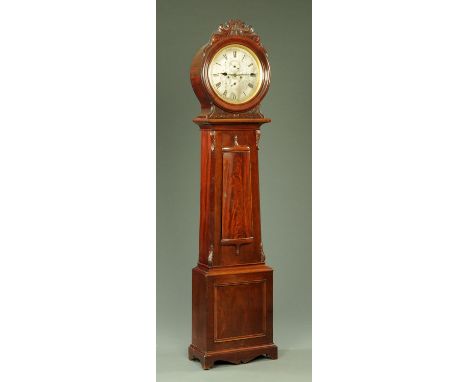 A mahogany longcase clock, 19th century, having a drumhead top with carved foliate pediment, the silvered dial with subsidiar