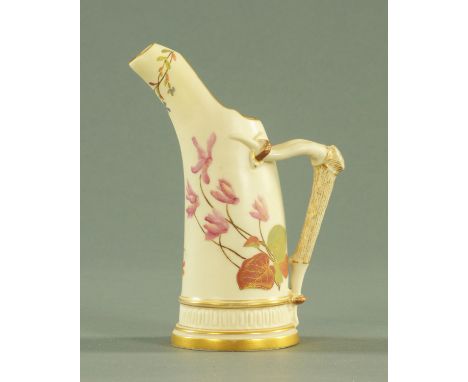 A Royal Worcester ivory ground tusk jug, date code for 1888, with moulded stag horn handle and floral spray decoration, print