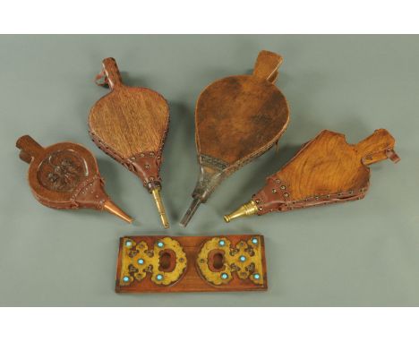 A Victorian shelf with folding ends, with applied brass mounts and set with coloured glass beads, interior width 30.5 cm, tog