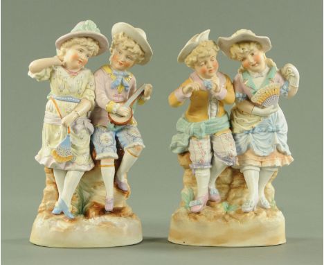 A pair of Continental bisque figures, children, decorated in pastel shades.  Height 33 cm.  CONDITION REPORT: The head of the