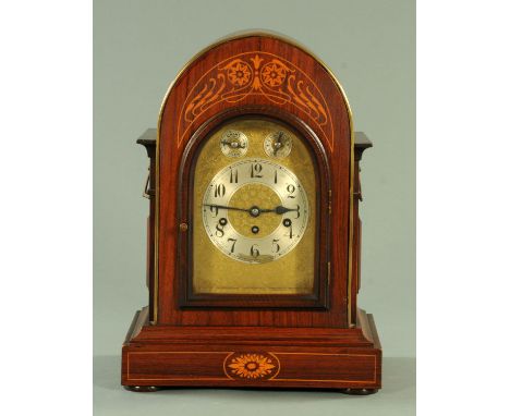An Edwardian rosewood bracket clock, with three train Wurttenberg spring driven movement striking on four gongs, height 44 cm