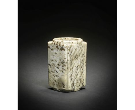 A STRIATED JADE VESSEL, CONGMing/Qing DynastyThe square-sectioned archaistic vessel with plain sides and indented corners, wi