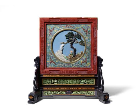 A SUPERB IMPERIAL CLOISONNÉ ENAMEL, LACQUER AND ZITAN EMBELLISHED DOUBLE-SIDED SCREEN AND STANDQianlongThe central moon-shape