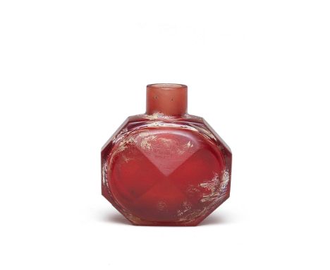 A RUBY-RED GLASS FACETED SNUFF BOTTLECirca 1730-1840The transparent bottle of deep-ruby-red colour, carved on either side wit