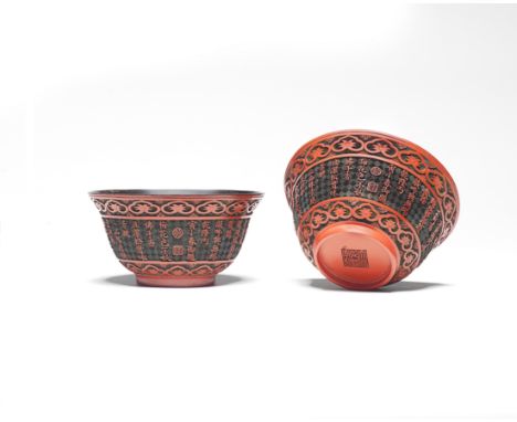 A VERY RARE PAIR OF IMPERIAL INSCRIBED CINNABAR LACQUER CARVED TEA BOWLSQianlong seal marks and of the period, the inscriptio