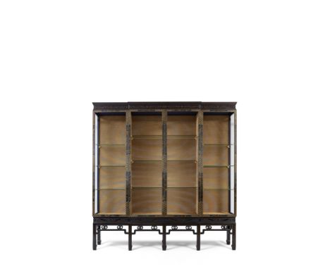 A LACQUERED DISPLAY CABINET COMMISSIONED FOR THE PARRY COLLECTIONCirca 1930sThe central part comprising three sections, each 