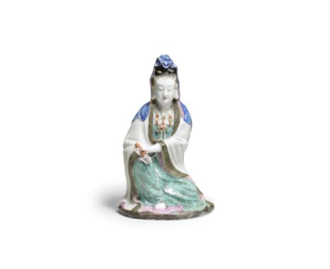 A FAMILLE ROSE FIGURE OF GUANYIN18th centuryThe Goddess of Mercy finely modelled seated with her right leg raised, her left a