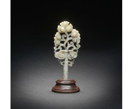 A RARE PALE GREEN AND BLACK JADE 'LINGZHI' AUSPICIOUS EMBLEM17th centurySkillfully carved in openwork as an auspicious lingzh