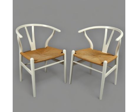 Hans Wegner, a pair of Danish Wishbone dining chairs by Carl Hansen, with maker's plaques, height 75cmGood condition, light s