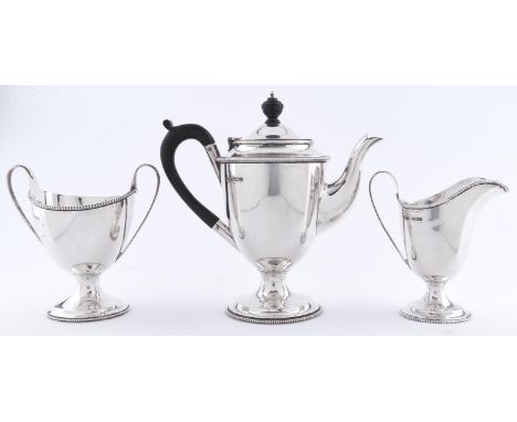 An Edwardian silver vase shaped tea service, with beaded rims, teapot 18cm h, by Joseph Rodgers &amp; Sons Ltd, 1906, 09 and 