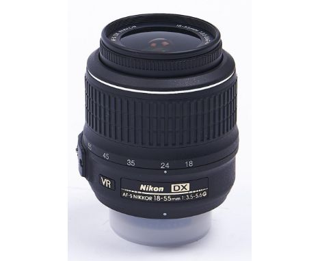 A Nikon AF-S Nikkor DX 18-55mm F3.5-5.6 G VR lens, with both caps, boxed 