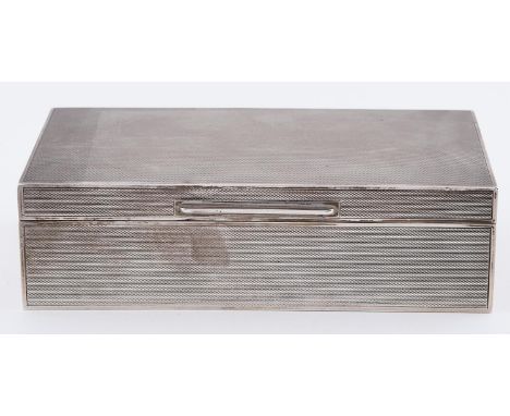 An Elizabeth II silver cigarette box, engine turned, cedar lined, 17.5cm, Birmingham 1970 
