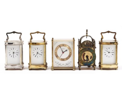 A miniature lacquered brass electric lantern-clock in 17th c style, 17cm h; a pair of reproduction brass cased carriage clock