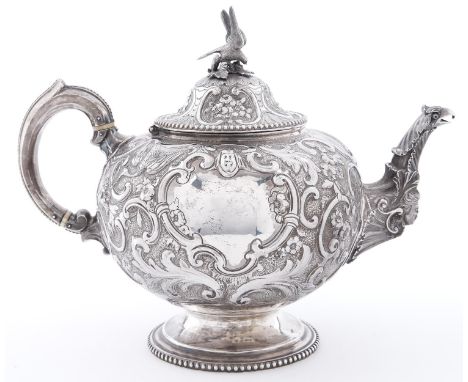 A Victorian silver teapot, of globular form, crisply chased with flowers and c-scrolls in beaded rims, 20cm h, by Robert Harp