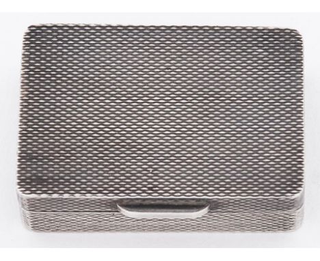 An Elizabeth II silver pill box, engine turned overall, 27 x 37mm, by K L Downes, Birmingham 1979, 12dwts 