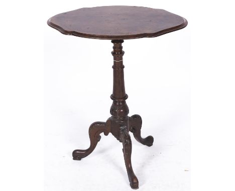 A Victorian walnut tripod table, shaped oval top 62cm 