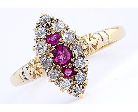 A ruby and diamond navette cluster ring in gold, 14 x 8mm, marked 18ct, 2.5g, size N 