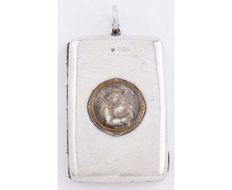 A George V silver lady's cigarette case, the front later applied with plated medallion of a piper, 81mm excluding ring, by C 