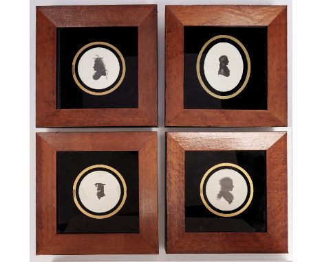 A set of four bird's eye maple and ebonised picture frames, each with verre eglomise mount and print of a late 18th c English