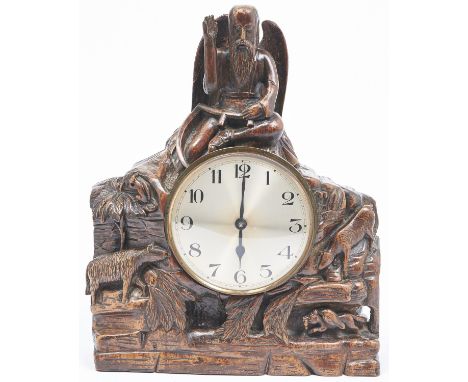 A carved oak mantel clock in the form of Father Time, early 20th c, 39cm h 