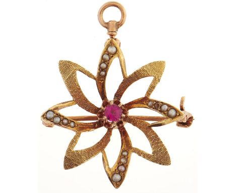A split pearl and synthetic ruby flower brooch-pendant, in gold marked 10k, 2.9g 